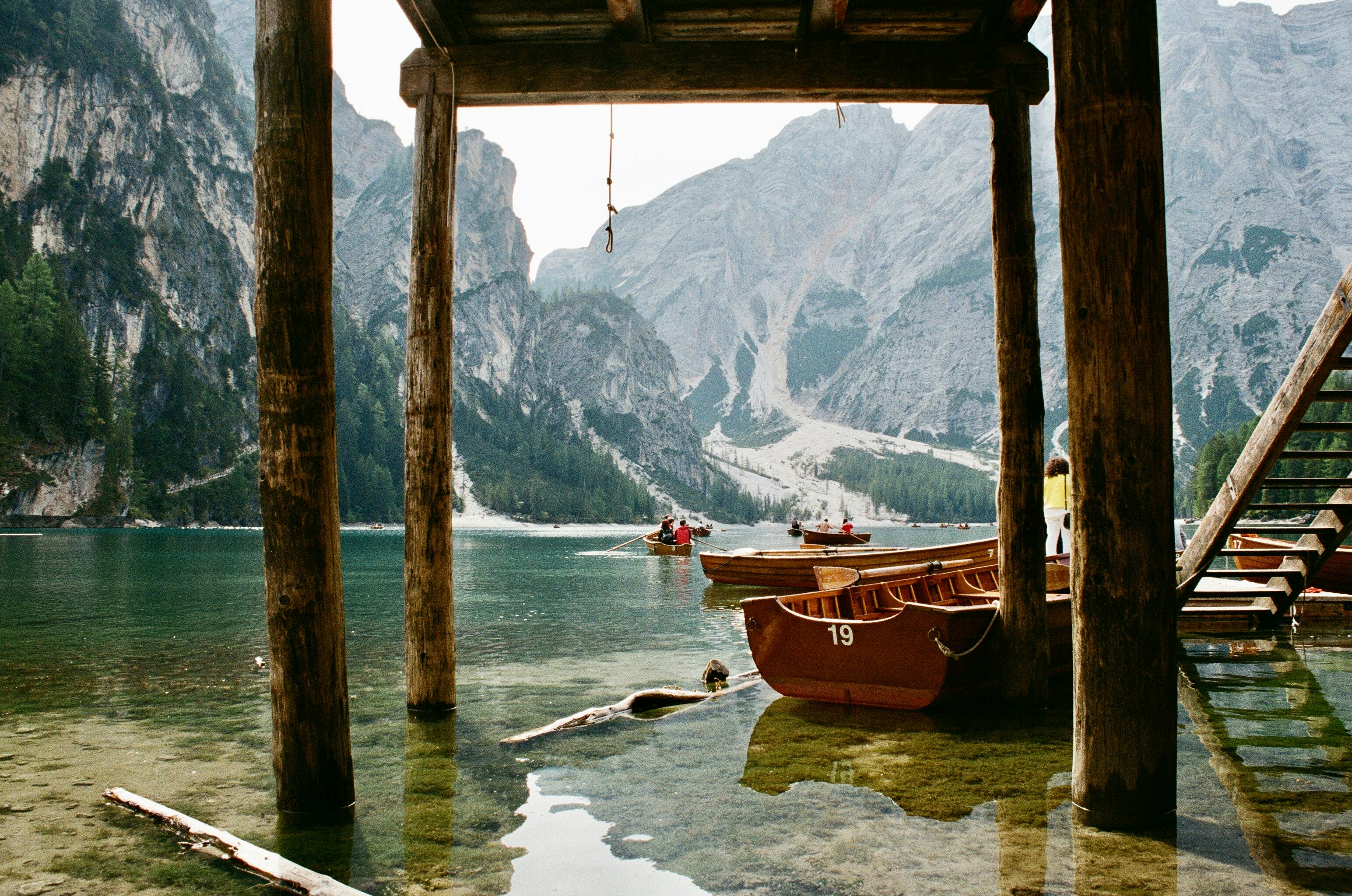 Row boats in mountains